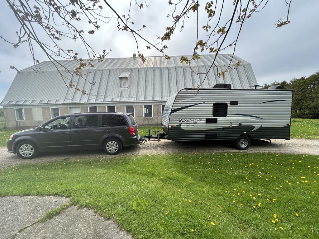 IMG_6183 Van attached to a travel trailer outside of a steel barn